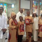 Barrister Uwolloh family receiving Achievers award